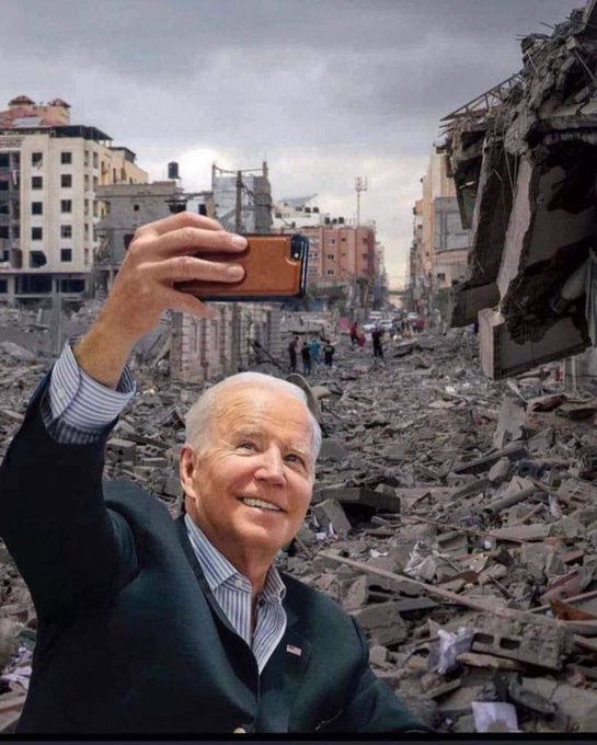 Biden support Palestinian genocide - photoshopped image showing Biden taking a selfie in front of bombed rubble supposedly in Gaza